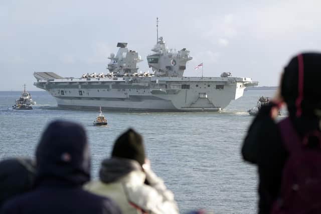 F35b jets line the deck of HMS Queen Elizabeth, as the Royal Navy aircraft carrier leaves Portsmouth Harbour on November 3. Picture:  Andrew Matthews/PA Wire