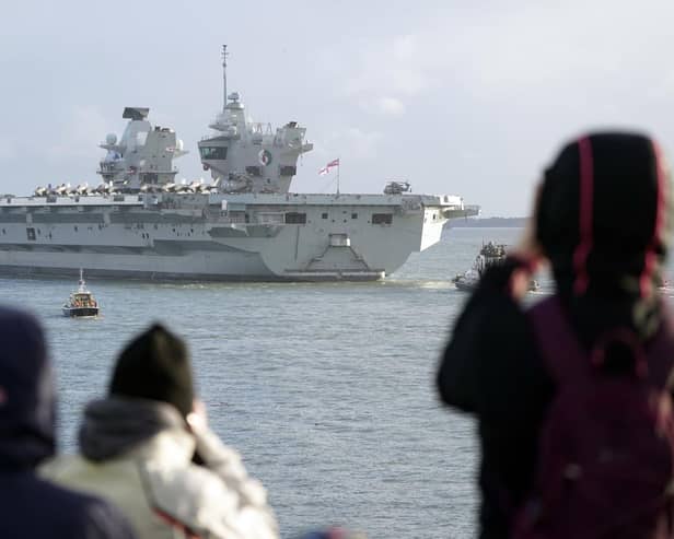 F35b jets line the deck of HMS Queen Elizabeth, as the Royal Navy aircraft carrier leaves Portsmouth Harbour on November 3. Picture:  Andrew Matthews/PA Wire