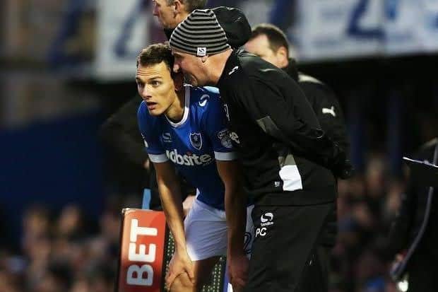Kal Naismith wirth former Pompey skipper Paul Cook. Picture: Joe Pepler