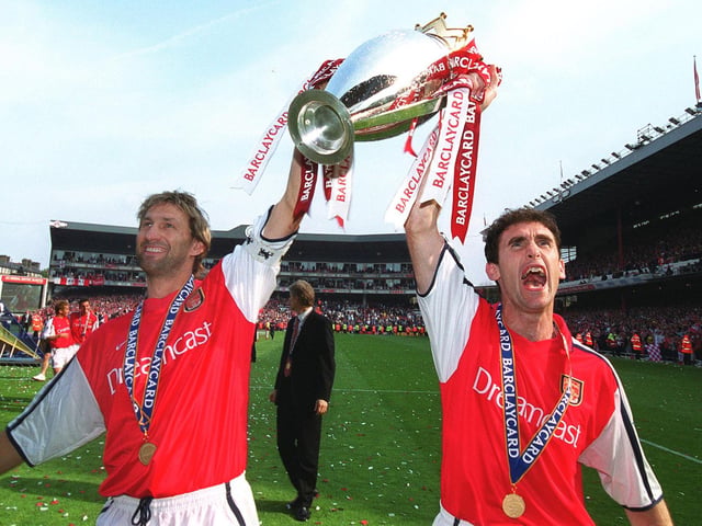 Tony Adams is regarded as an Arsenal legend. While playing for the Gunners, he won the First Division in 1988-89, 1990-91, 1997-98, and 2001-02. Pictured: Tony Adams and Martin Keown of Arsenal with the Premier League trophy after the match between Arsenal and Everton on May 11, 2002. Picture: Stuart MacFarlane/Arsenal FC via Getty Images.