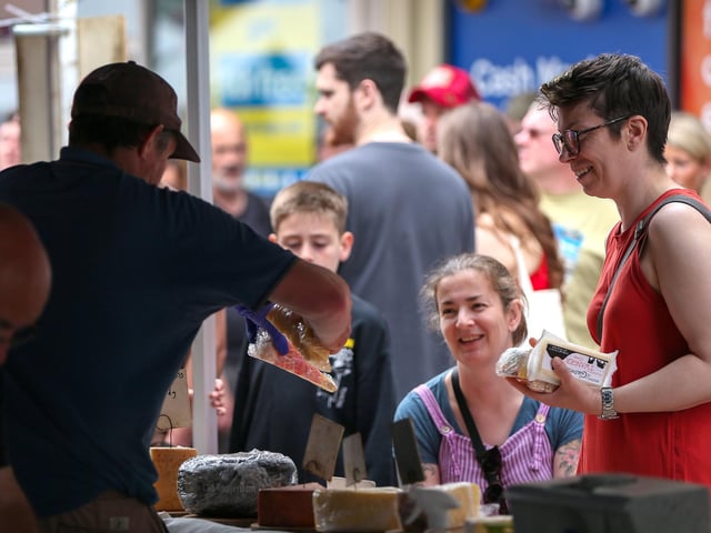 Buying cheese. Southsea Food Festival on Palmerston, Clarendon and Osborne RoadsPicture: Chris  Moorhouse (200724-15)