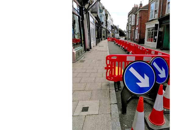 The council has been using road space to improve social distancing on pavements outside pubs and restaurants. Pictured: Changes to Castle Road