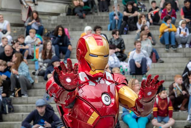 Iron man touring the Guildhall Square during Portsmouth Comic Con 2022. Picture: Mike Cooter (070522)