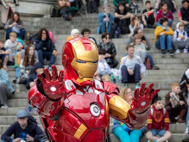 Iron man touring the Guildhall Square during Portsmouth Comic Con 2022. Picture: Mike Cooter (070522)