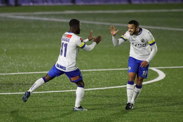 Abdulai Baggie, left, celebrates his first goal with Billy Clifford. Picture by Dave Haines