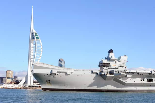 HMS Queen Elizabeth returned to Portsmouth on Thursday, October 13.

Picture: Sarah Standing (131022-1373)