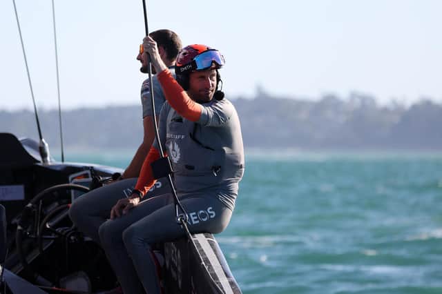 A small smile from Sir Ben Ainslie in INEOS Team UK after their win in race six against Prada Luna Rossa on Saturday. Photo by Fiona Goodall/Getty Images.