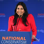 LONDON, ENGLAND - MAY 15: Britain's Secretary of State for the Home Department Suella Braverman speaks during the National Conservatism Conference at The Emmanuel Centre on May 15, 2023 in London, England. Traditionalist conservatives gather for their annual conference in Central London. National Conservatism values the concepts of custom, convention and tradition over individualism.  (Photo by Leon Neal/Getty Images):Suella Braverman at the National Consertism conference on May 15. Getty