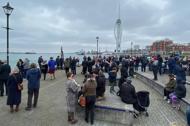 Crowds pictured outside The Spice Island Inn in Old Portsmouth ahead of the 41-gun salute on Saturday