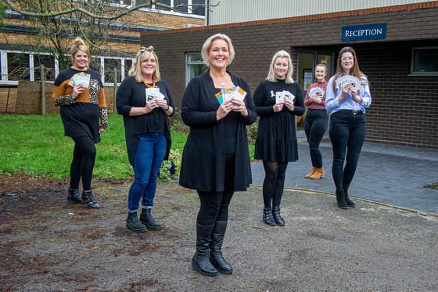 Stop Domestic Abuse are one of the charities being supported by the Comfort and Joy voucher appeal. Pictured: Stop Domestic Abuse staff, Rachel Windebank, Carla Payne, CEO Claire Lambon, Chelsea Haslett, Czarina Jacobs and Paige Merrett with some vouchers outside their office in Havant on 26 November 2020.


Picture: Habibur Rahman