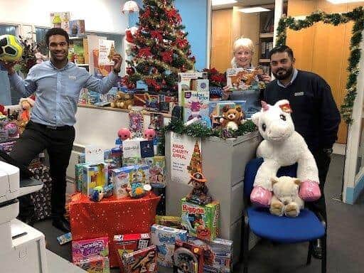 Left to right: Deslynn Barter (Store Manager), Anil Kumar (Assistant Manager) and Julian Hamilton (Customer Sales Advisor) during the Access Self Storage Christmas campaign last year.