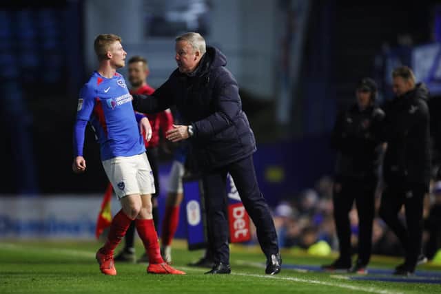 Kenny Jackett gives Andy Cannon a pep talk during tonight's 2-2 draw with Fleetwood. Picture: Joe Pepler