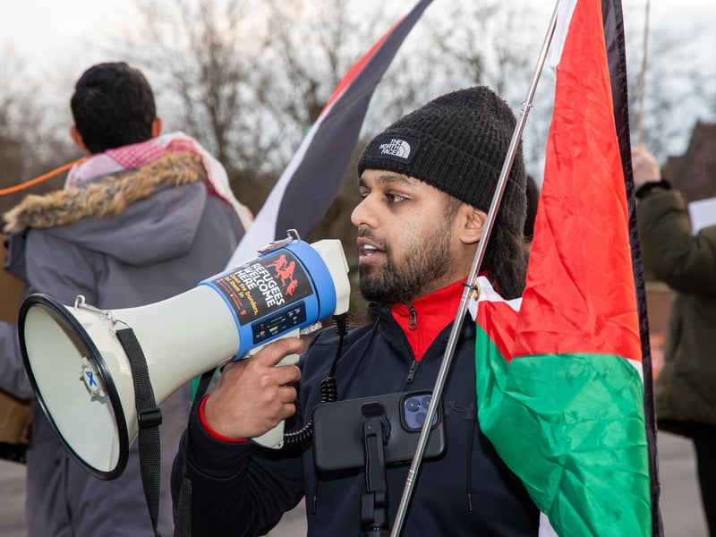 Demonstrators outside Unicorn Gate make their feelings known
Photos by Alex Shute