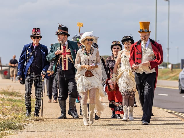 Members of the Gosport Steampunk Society during their promenade along Stokes Bay. 

Picture: Mike Cooter