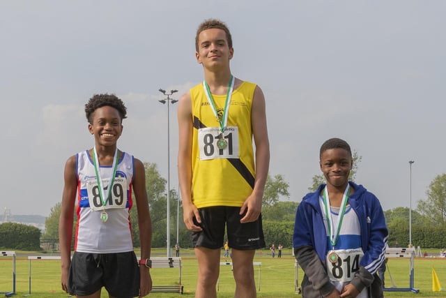 Under-13 boys 100m - Kai La Croix (second, left) and third-placed Aidon Gerald, right. Picture by Paul Smith
