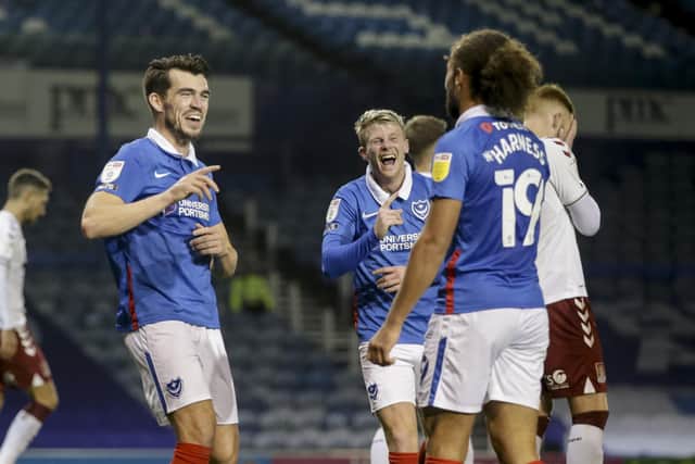 Pompey celebrate Marcus Harness' goal in the 4-0 win over Northampton. Picture: Robin Jones/Getty Images