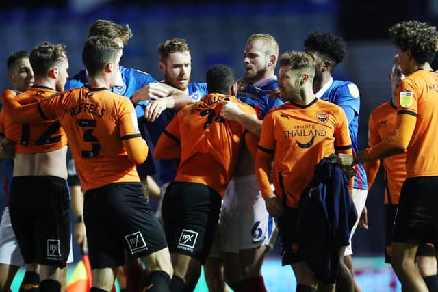 The melee after Pompey's 1-1 draw with Oxford. Picture: Joe Pepler