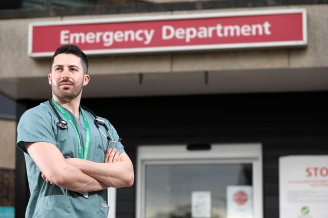 Junior doctor Raphael Lippa outside A&E at Queen Alexandra Hospital, Cosham. Picture: Chris Moorhouse