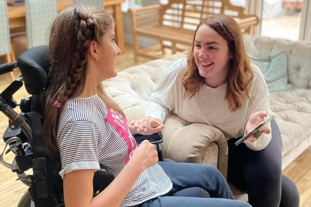 Ceri Winfield (right) from Fareham has launched an app to help disabled children and their families