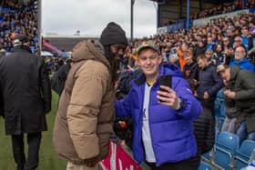 Linvoy Primus taking time for a quick selfie with a fan. Photo: Habibur Rahman