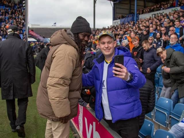 Linvoy Primus taking time for a quick selfie with a fan. Photo: Habibur Rahman