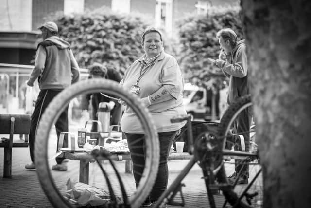 Penny Plimmer and Martine Bolton are creating a book which captures images and stories about the pandemic. Pictured: An image of Bev Saunders from Helping Hands Portsmouth