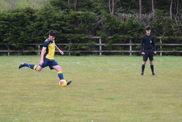 Jacob Payne completes his hat-trick at AFC Netley from the penalty spot. Picture: Dan (JMA Media).