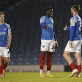 Ryan Tunnicliffe celebrates with Jay Mingi following Pompey's third goal in their 5-2 success over Southampton. Picture: Jason Brown/ProSportsImages