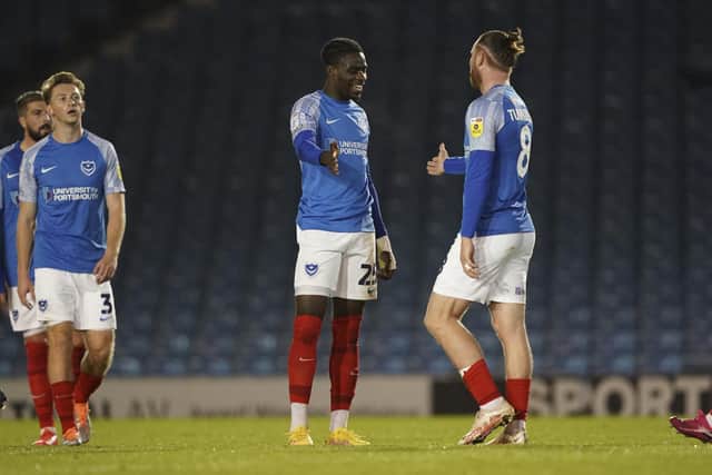 Ryan Tunnicliffe celebrates with Jay Mingi following Pompey's third goal in their 5-2 success over Southampton. Picture: Jason Brown/ProSportsImages