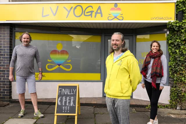 Luke Voulgarakis, in yellow, has reopened his yoga studio, LV Yoga, in West St, Fareham, now that Covid-19 restrictions are easing. He is pictured with fellow yoga teachers Victoria Beale and Warren Bright
Picture: Chris Moorhouse (jpns 160521-07)