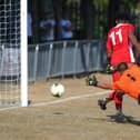 Rudi Blankson scores  Horndean's late winner against Shaftesbury. Picture by Martyn White.