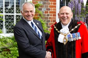Councillor Jamie Hutchinson hands over to Councillor Martin Pepper