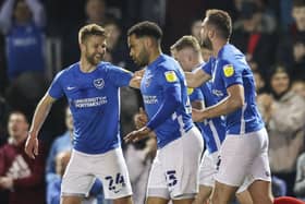 Clark Robertson is congratulated by Michael Jacobs after heading home his free-kick in the first half against Rotherham. Picture: Robin Jones - Digital South