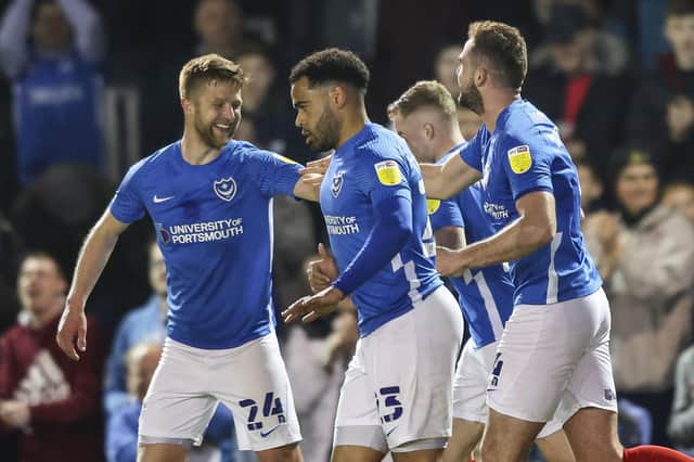 Clark Robertson is congratulated by Michael Jacobs after heading home his free-kick in the first half against Rotherham. Picture: Robin Jones - Digital South
