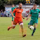 Portchester's Brett Pitman in action against Brockenhurst. Picture: Mike Cooter (270822)