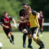 Callum Dart, right, in action for Baffins against Fleetlands in a pre-season friendly. Picture: Chris Moorhouse