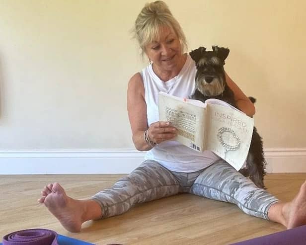 Karen and her dogo Hugo preparing for class