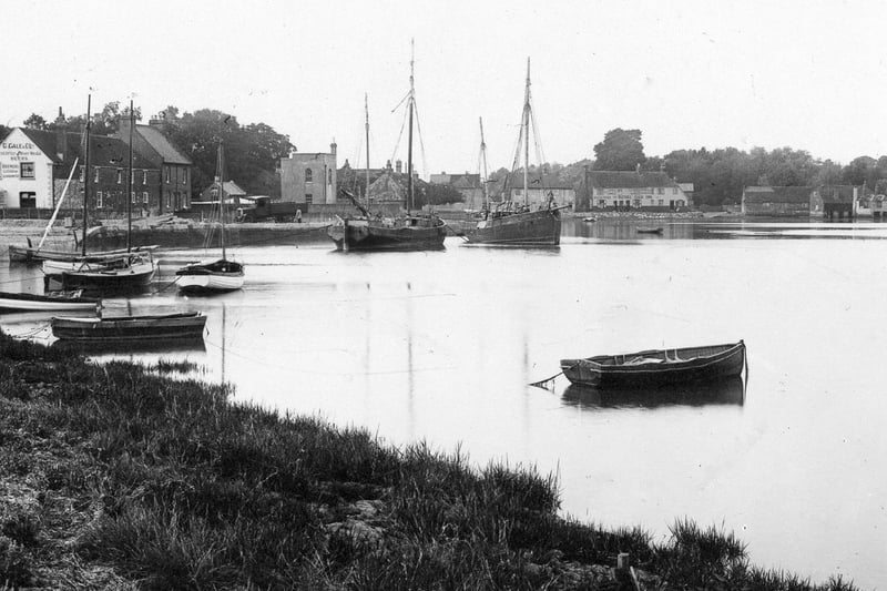 Oyster schooners in Langstone Harbour. A very tranquil scene looking across to the Royal Oak from Langstone bridge.
