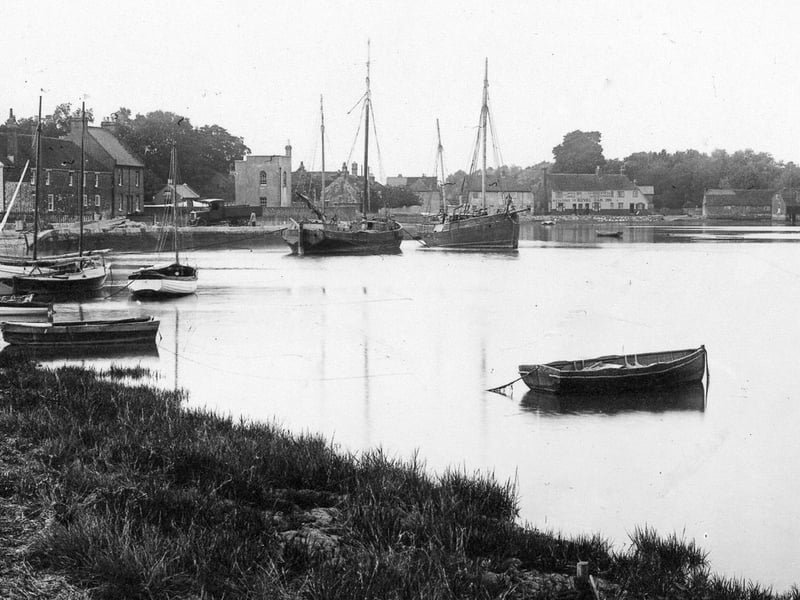 Oyster schooners in Langstone Harbour. A very tranquil scene looking across to the Royal Oak from Langstone bridge.