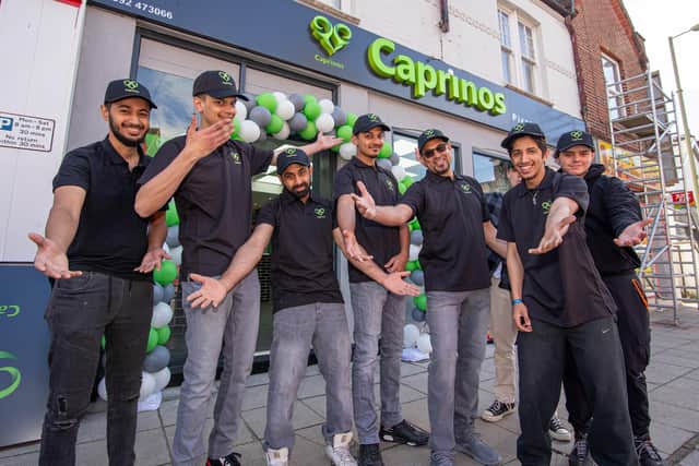 Pictured: Staff of Caprinos Pizza outside their new shop.

Picture: Habibur Rahman