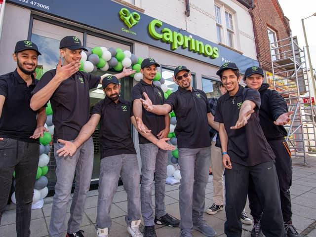 Pictured: Staff of Caprinos Pizza outside their new shop.

Picture: Habibur Rahman