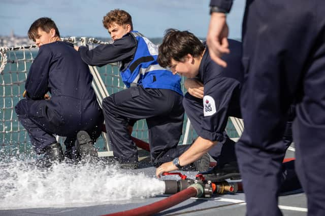 The ship's company on firefighting equipment used onboard HMS Lancaster. Photo: PO Phot Carl Osmond