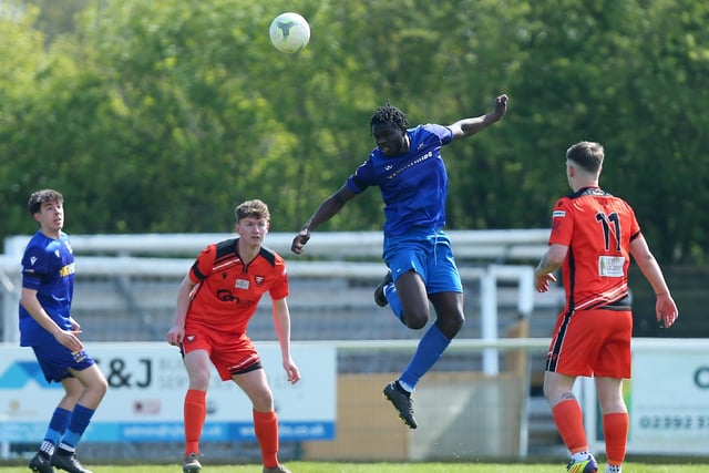 Tyrhys Lukonyomoi heads clear for Baffins Milton Rovers Reserves. Picture: Chris Moorhouse