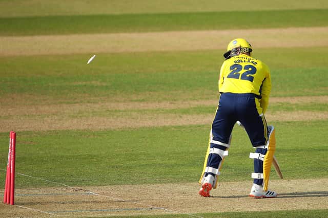 Ian Holland of Hampshire is bowled by Sam Cook. Photo by Warren Little/Getty Images.