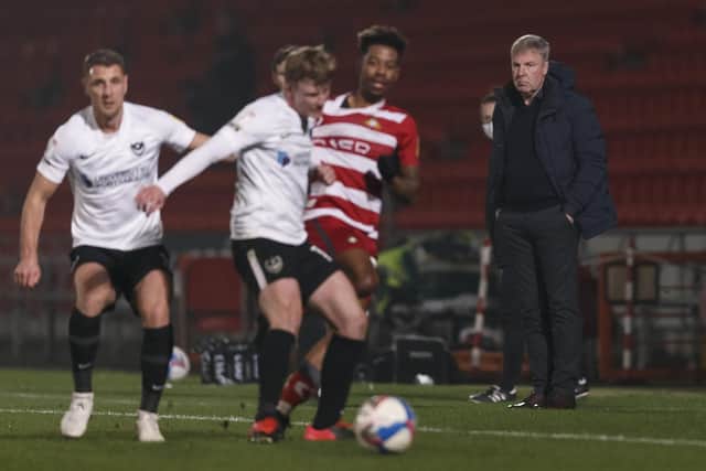 Kenny Jackett watches on as Pompey lose 2-1 at Doncaster on Tuesday night. Picture: Daniel Chesterton/phcimages.com