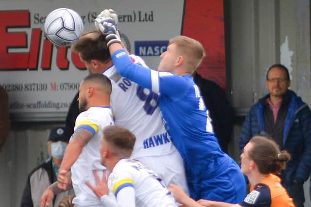 Hawks debutant keeper Will Mannion punches clear. Picture: Martyn White