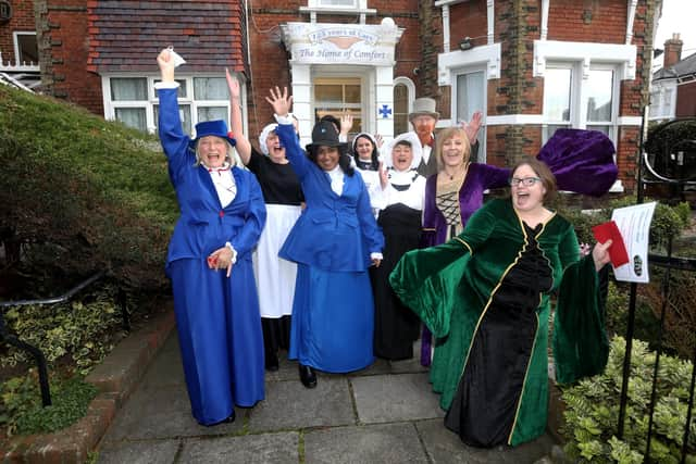 Celebrating in front of Home of Comfort, Southsea.