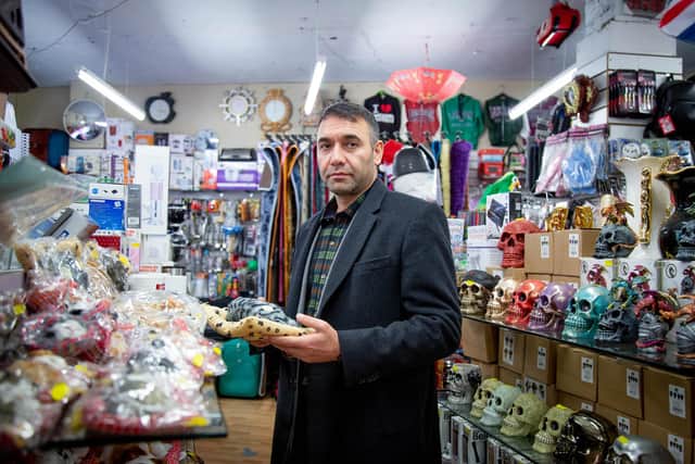 Business owner, Naj Qader of Galaxy Discount Store