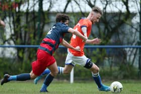 Defender Lewis Crook, right, has played in goal in Denmead's last three matches. Picture: Chris Moorhouse