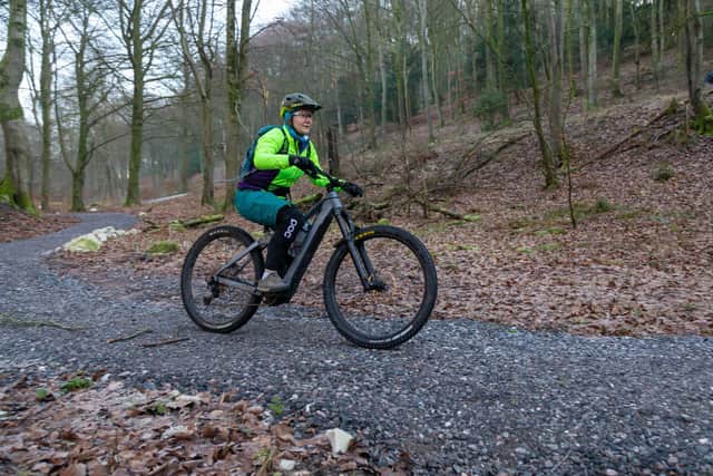 A visitor tests out the new mountain bike  trail in Queen Elizabeth Country Park. Picture: Mike Cooter (210123)